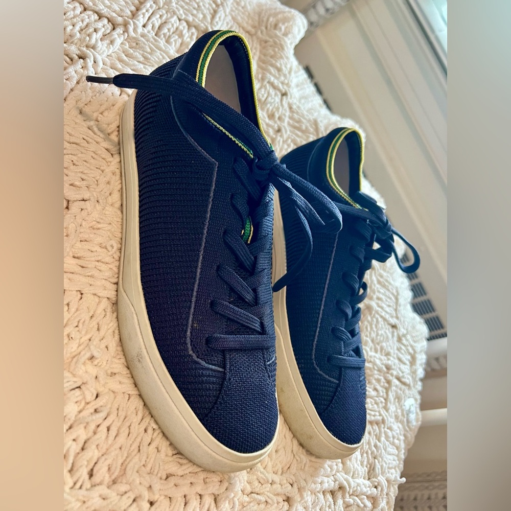navy blue Rothy’s laceup sneakers